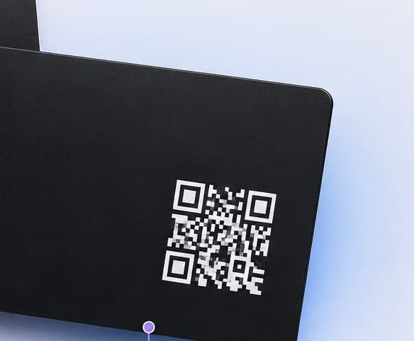 The printed QR code on the back of the Qshot Metal Card