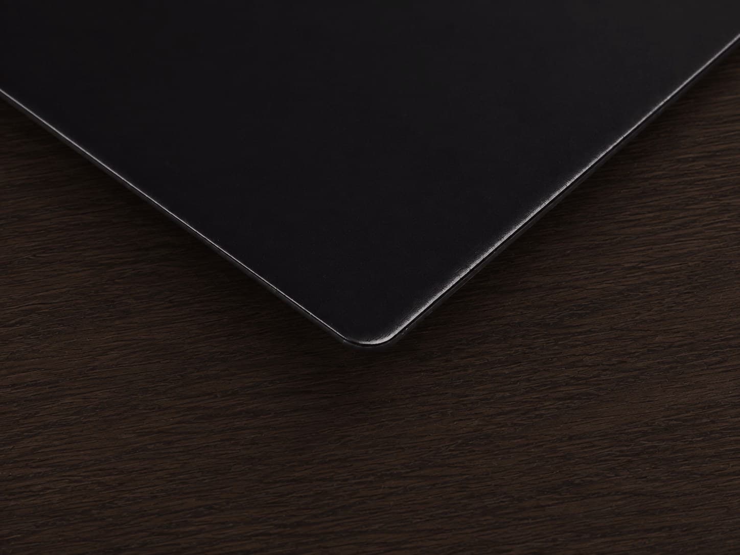 Close-up of the metal card's softened edge